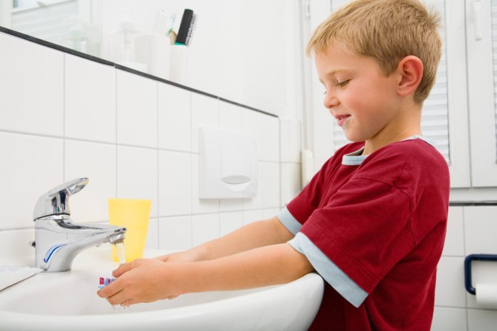 boy brushing teeth boy brushing teeth
