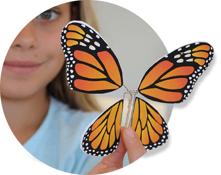 Earth Ranger holding a craft butterfly Earth Ranger holding a craft butterfly