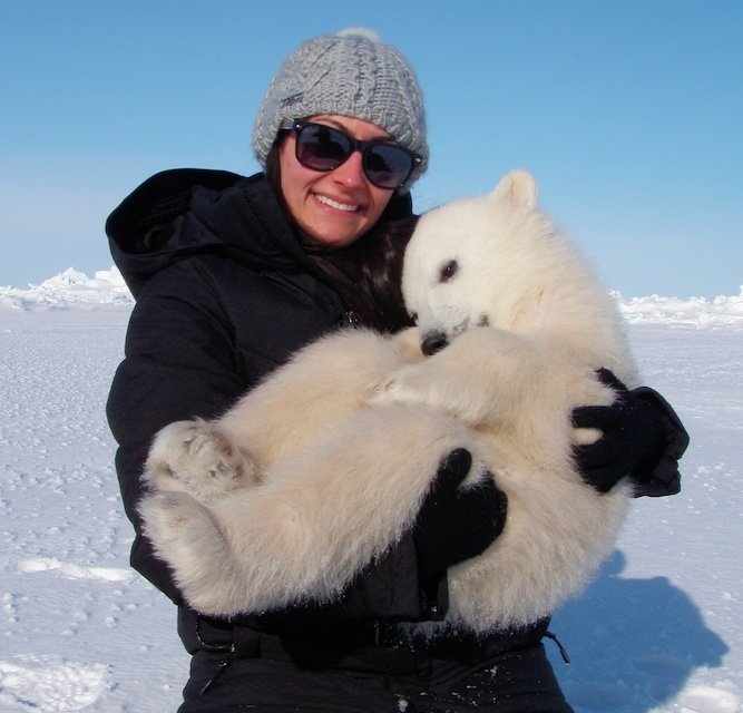 researcher L Sciullo with polar bear