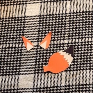 red-fox-craft-step5 Glue together the pieces for your ears and tail.