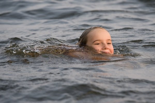 Young girl swimming
