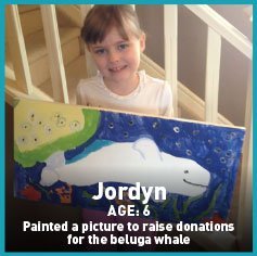Jordyn painting a beluga whale